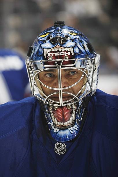 A close view of Curtis Joseph wearing his painted Cujo mask with the Toronto Maple Leafs in 2008
