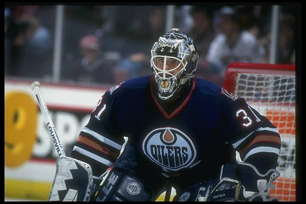 Curtis Joseph in goal for the Edmonton Oilers in February 1997