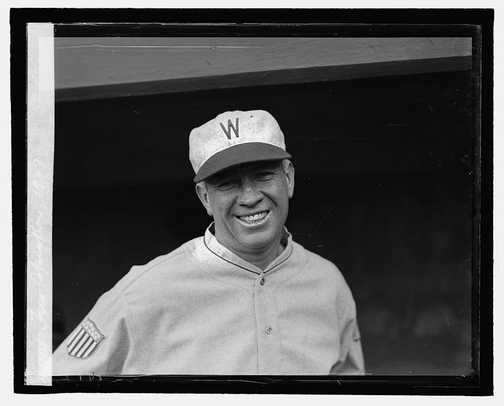 Tris Speaker smiling in a Washington Senators uniform in 1927