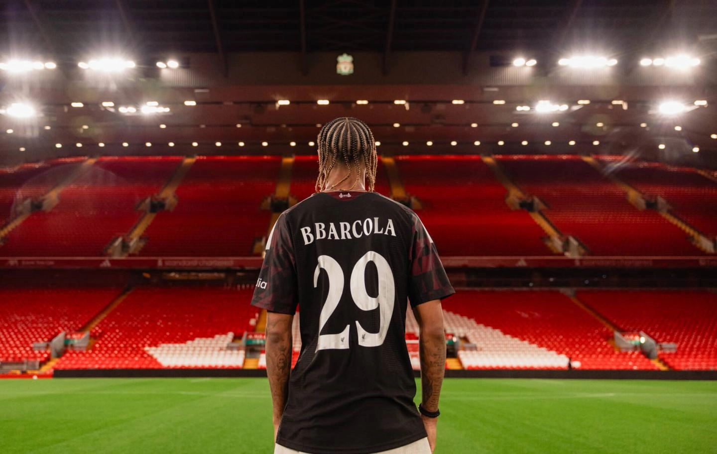 Bradley Barcola wearing his Liverpool shirt at Anfield
