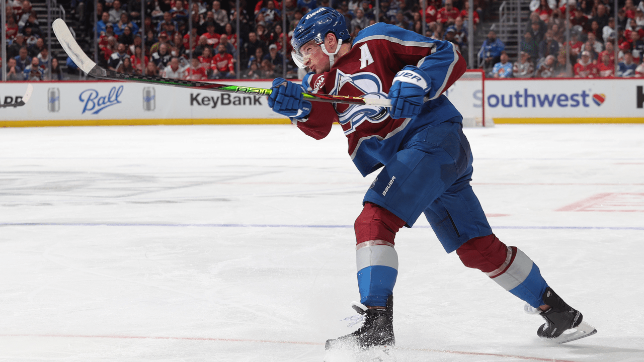 Cale Makar shoots the puck for the Colorado Avalanche