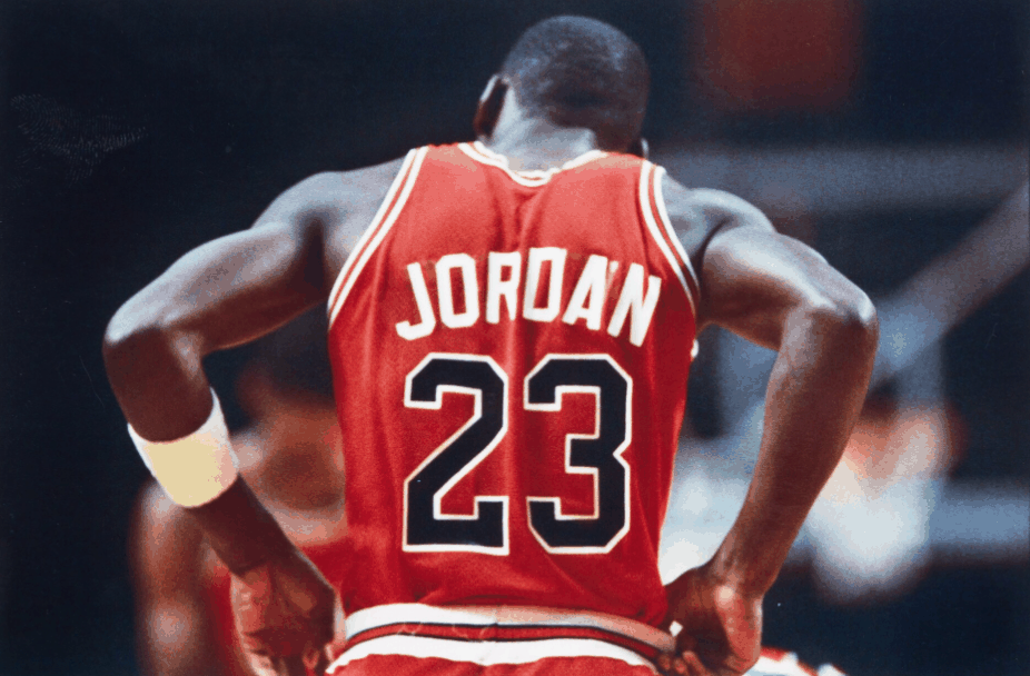 Michael Jordan seen from behind in his red Chicago Bulls number 23 jersey