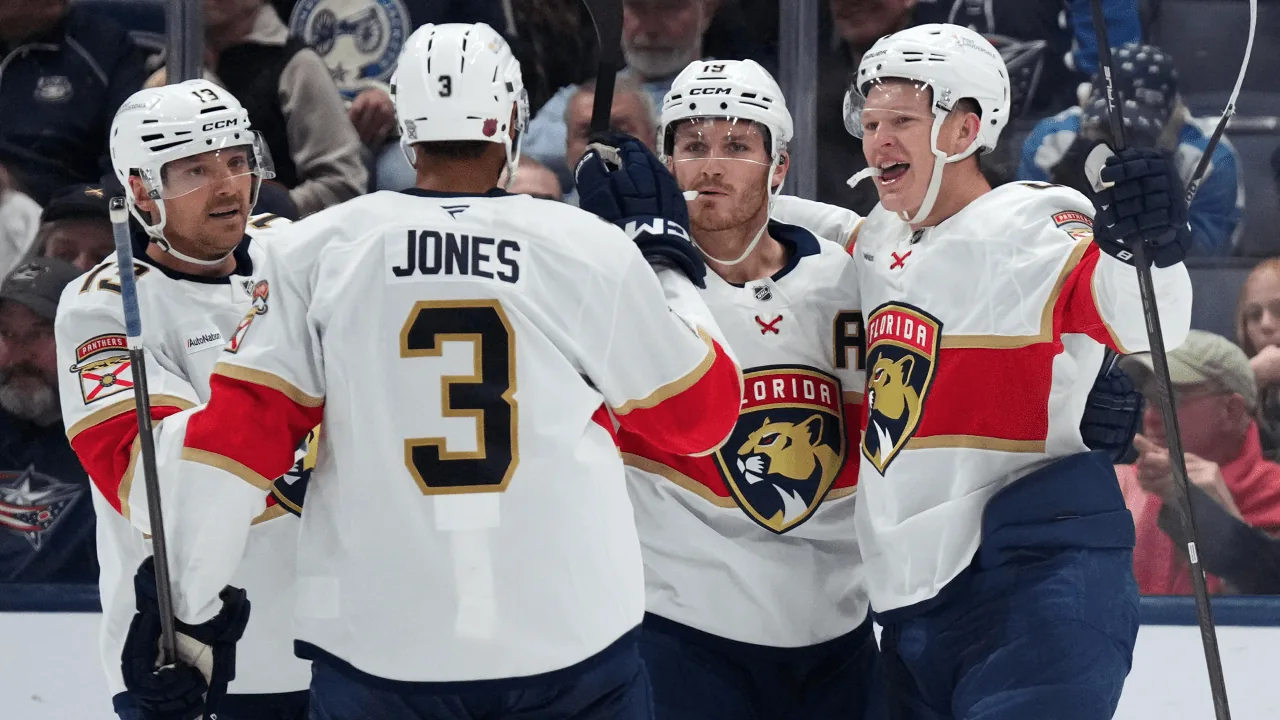 Brady and Matthew Tkachuk celebrate with Seth Jones and Sam Reinhart during Florida’s win in Columbus.