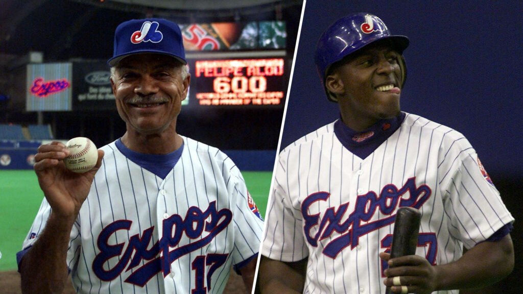 Felipe Alou, left, and Vladimir Guerrero in Montreal Expos uniforms.