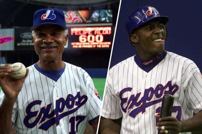 Felipe Alou, left, and Vladimir Guerrero in Montreal Expos uniforms.