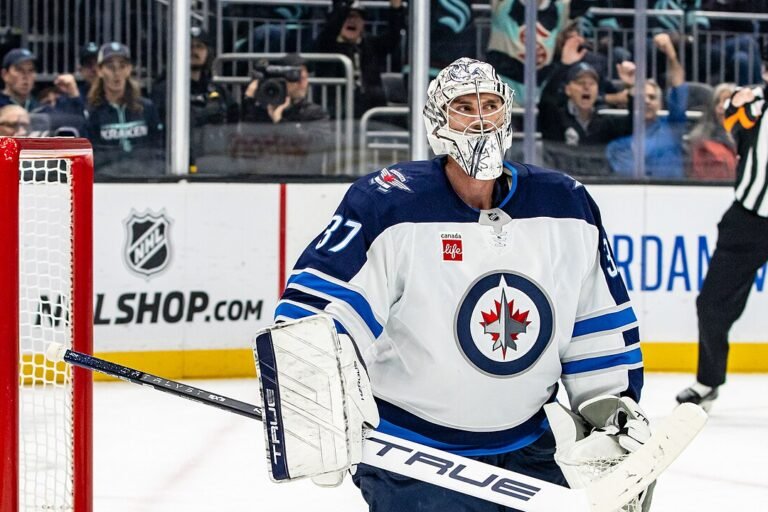 Connor Hellebuyck in goal for the Winnipeg Jets