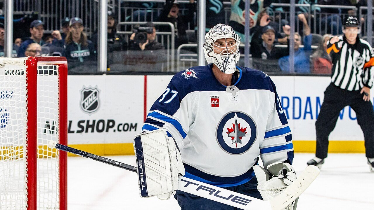 Connor Hellebuyck in goal for the Winnipeg Jets