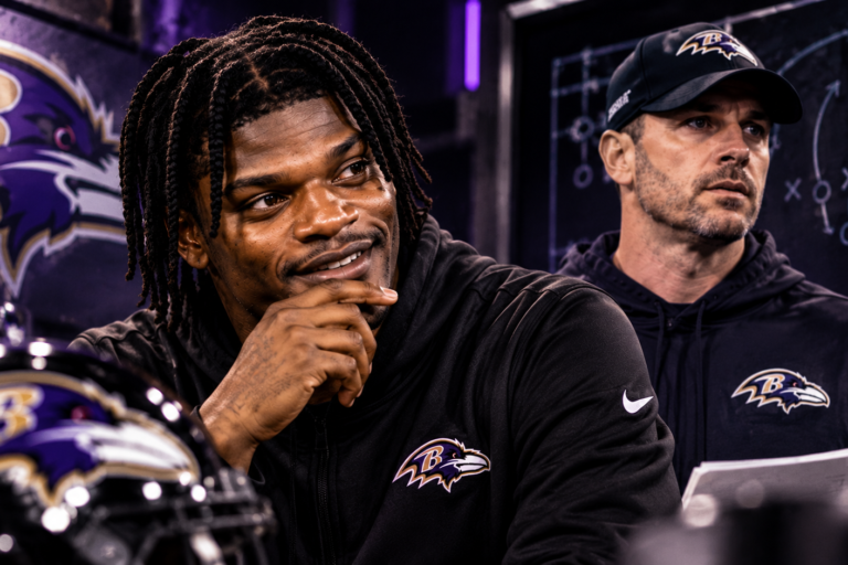 Lamar Jackson and Baltimore Ravens offensive coordinator Declan Doyle