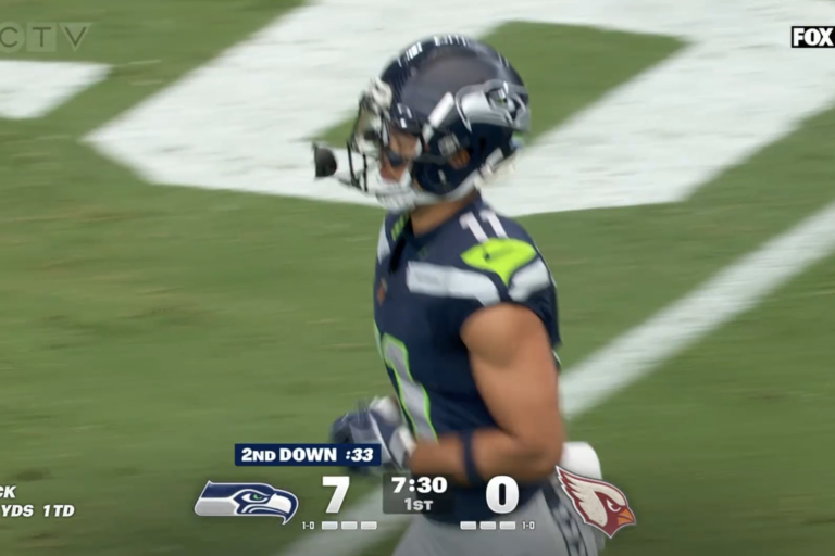 Jaxon Smith-Njigba in Seattle’s No. 11 jersey during the first quarter against Arizona, with the Seahawks leading 7–0.