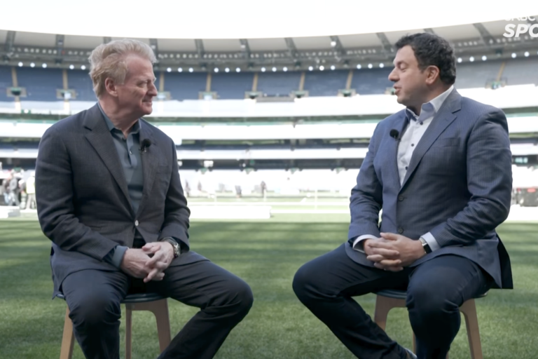 Roger Goodell, left, speaks with CNBC’s Alex Sherman at the Melbourne Cricket Ground.
