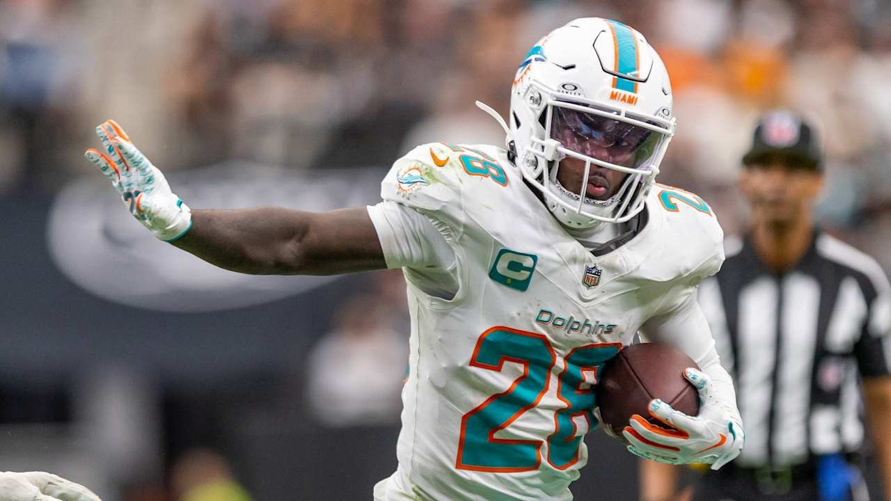 File photo: De’Von Achane carries the ball for Miami. NFL.com published this image with its September 28, 2026 injury report; capture date not supplied.
