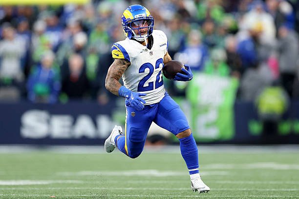Blake Corum carries the football for the Los Angeles Rams against the Seattle Seahawks.