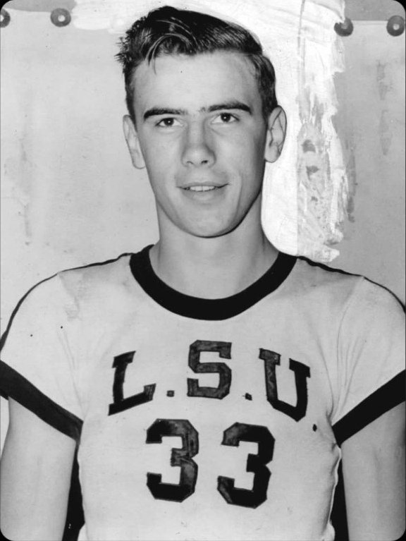 Bob Pettit wearing an LSU basketball jersey.