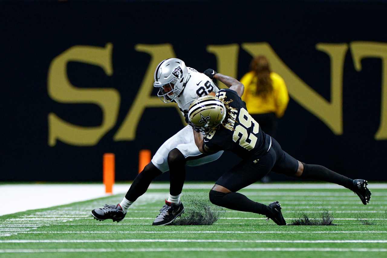 Brock Bowers carries the ball as a Saints defender tackles him during the Raiders’ September 27, 2026 game