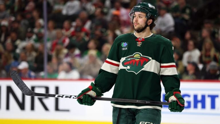 Brock Faber in a Minnesota Wild uniform on the ice