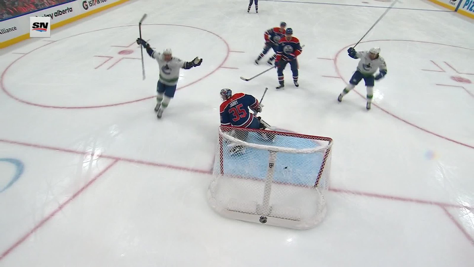 Vancouver players celebrate Paul Cotter’s goal against Edmonton at Rogers Place on September 29, 2026. Sportsnet broadcast still via ESPN.