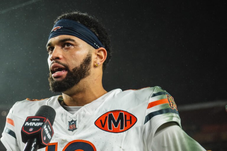 Caleb Williams in a white Chicago Bears jersey during an on-field interview in October 2025.