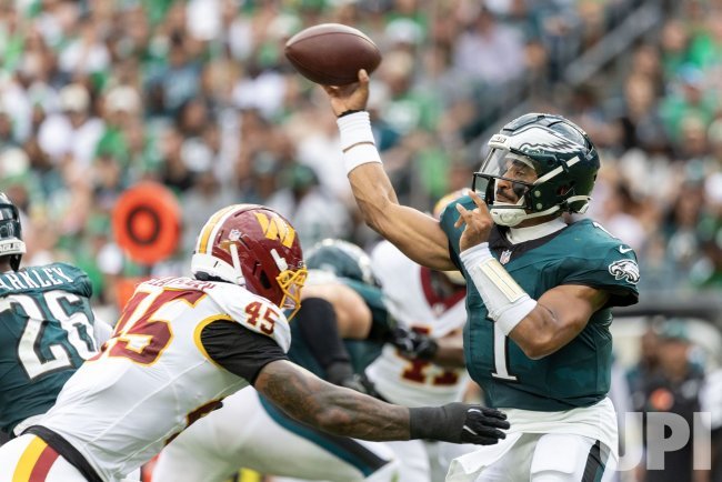 Jalen Hurts under pressure from Washington during the Eagles' Week 1 game on September 13, 2026