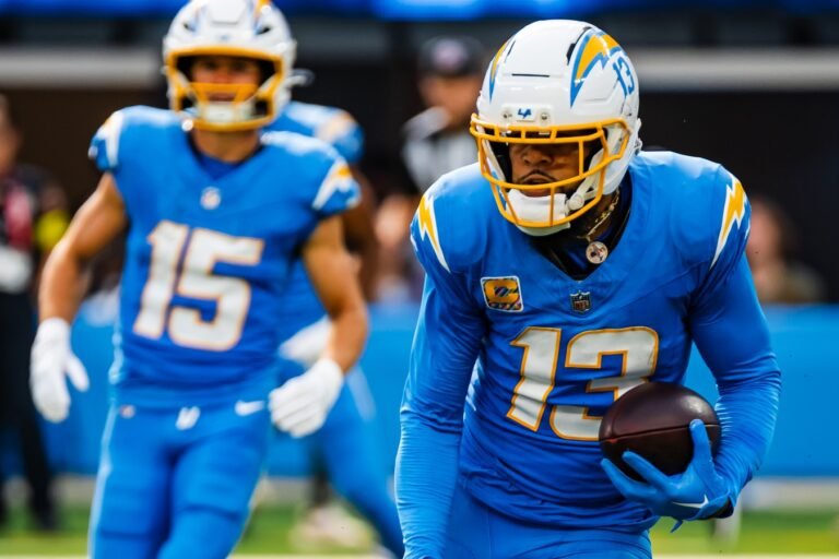 Keenan Allen carries the football for the Los Angeles Chargers during the 2025 season.