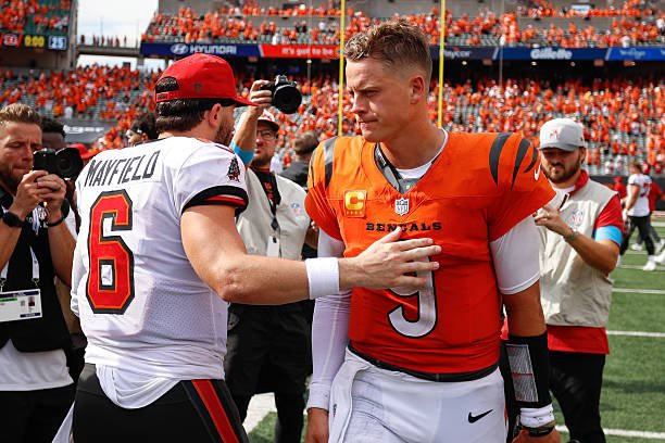 Baker Mayfield and Joe Burrow meet on the field after the Buccaneers-Bengals season opener in Cincinnati.