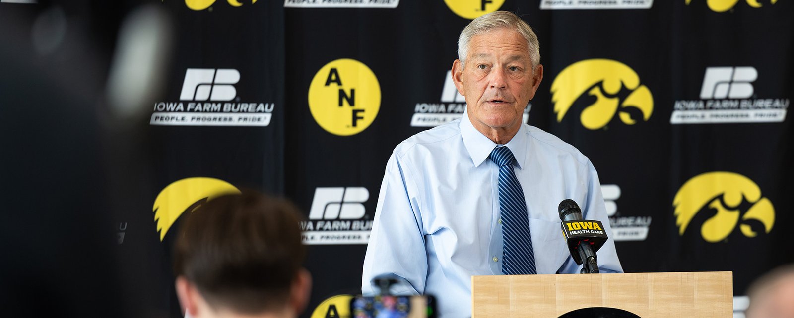 Kirk Ferentz pictured in Iowa’s Ohio State week news-conference coverage
