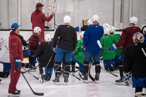 Jared Bednar illustrating a drill at Colorado Avalanche practice