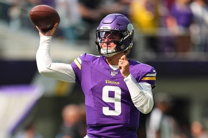 J.J. McCarthy throws during warmups in a Minnesota Vikings uniform on September 13, 2026.