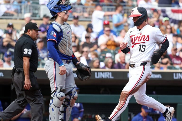 Luke Keaschall scores on Josh Bell’s first-inning sacrifice fly against Texas on September 27, 2026.