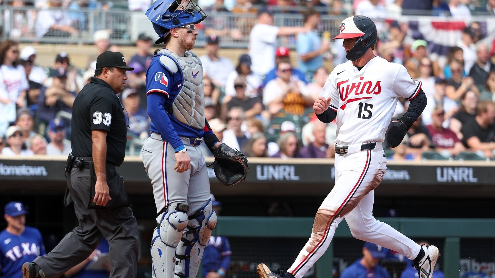 Luke Keaschall scores on Josh Bell’s first-inning sacrifice fly against Texas on September 27, 2026.