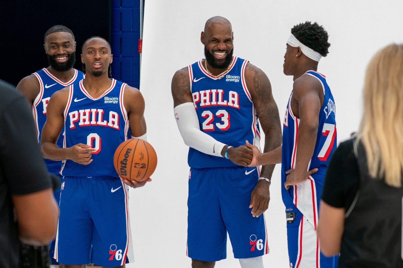 Brown, Maxey, James and Edgecombe preparing for their media-day group portrait