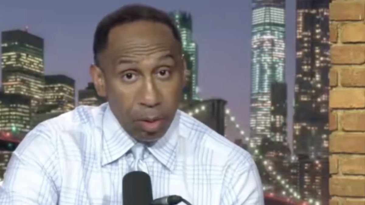 Stephen A. Smith speaking into a microphone on The Stephen A. Smith Show.
