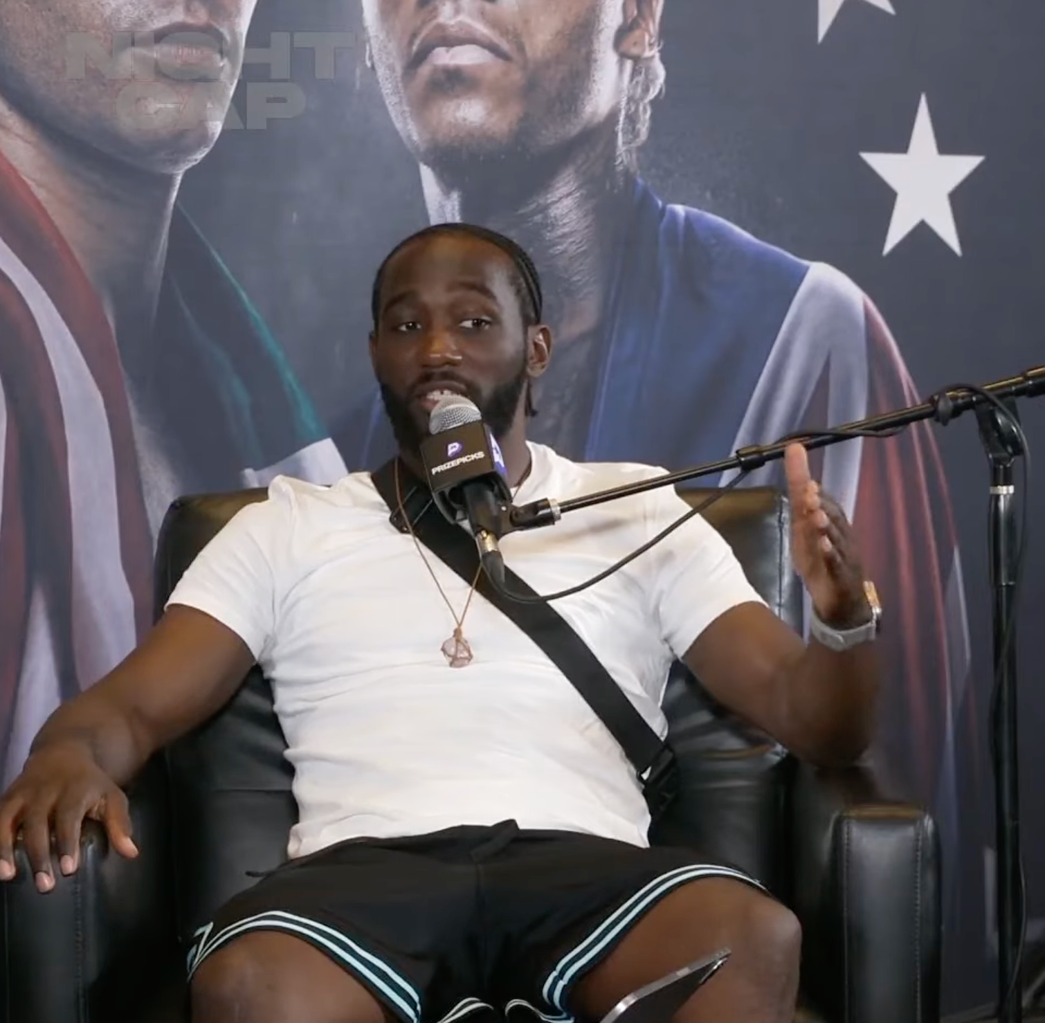 Terence Crawford speaking into a microphone during a Nightcap interview in Las Vegas.