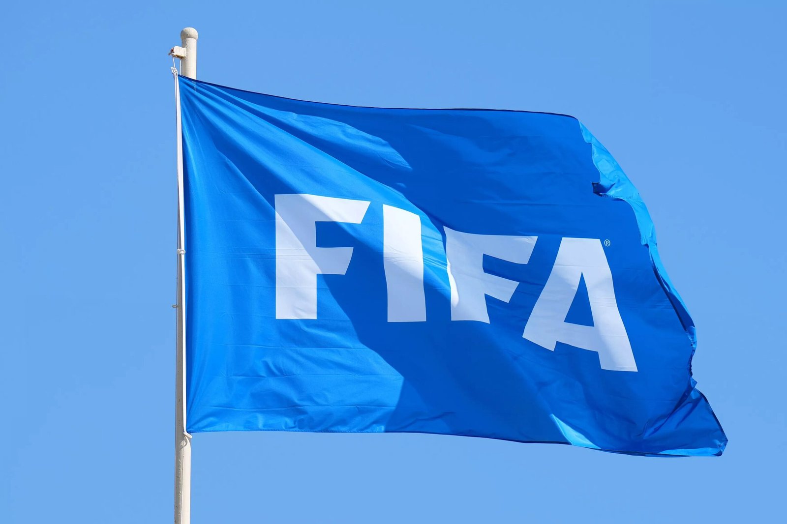 A FIFA flag displayed before a Club World Cup match.
