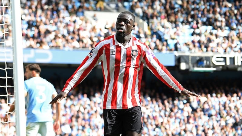 Brian Brobbey celebrates his second goal against Manchester City.