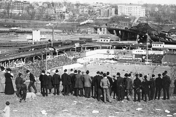 Spectators watch the Polo Grounds from Coogan’s Bluff on September 23, 1908.