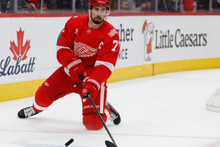 Dylan Larkin carries the puck against Columbus.