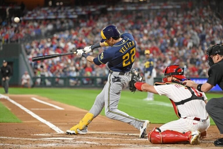 Christian Yelich bats against Philadelphia at Citizens Bank Park.