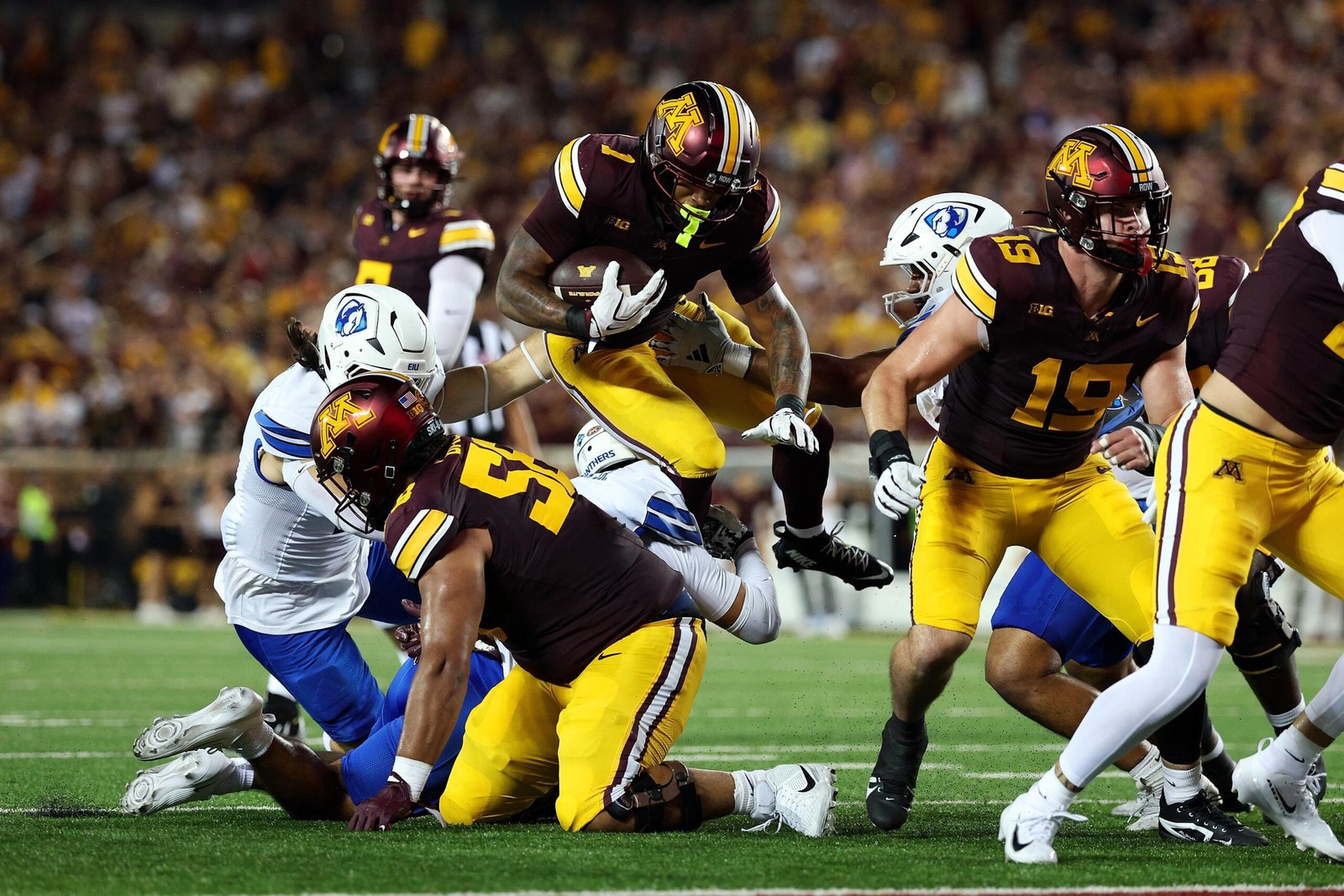 Darius Taylor carries the ball against Eastern Illinois.