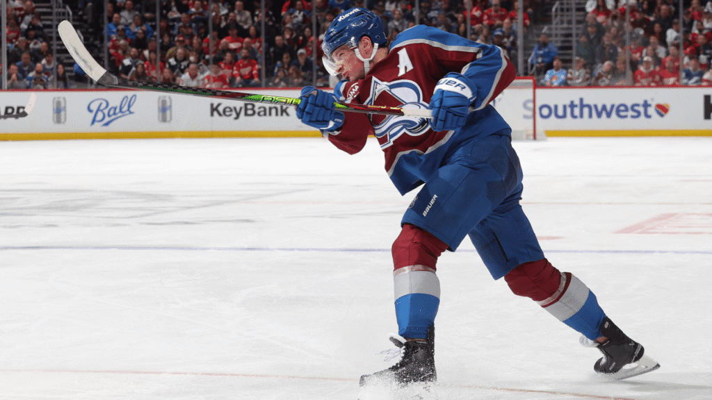 Cale Makar shoots the puck for the Colorado Avalanche
