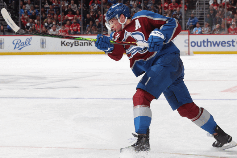 Cale Makar shoots the puck for the Colorado Avalanche