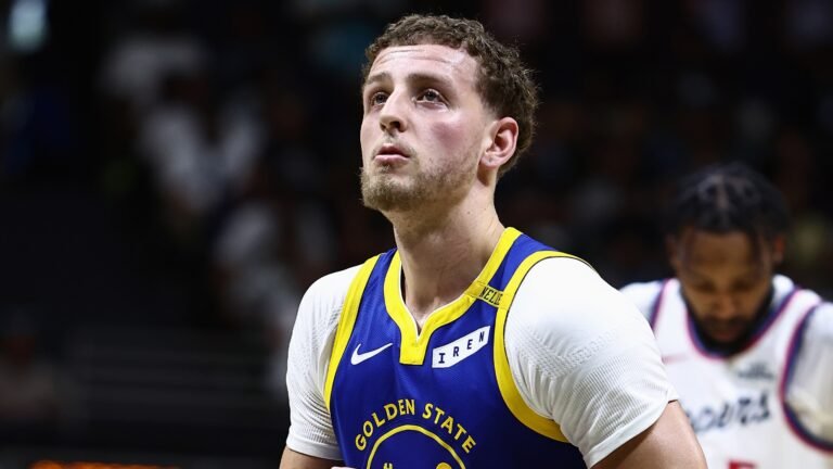 Brandin Podziemski wearing his Golden State Warriors jersey.