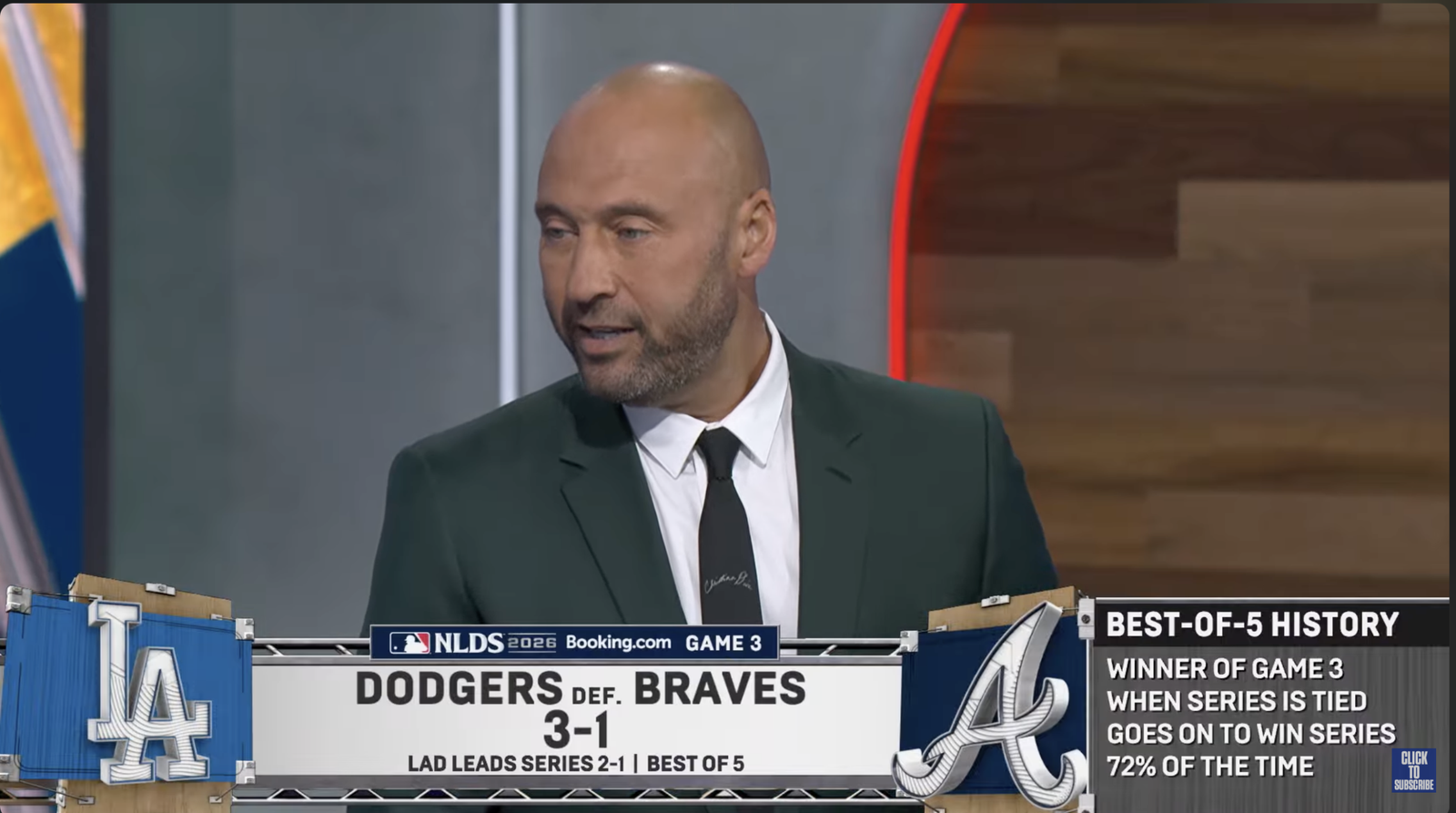 Derek Jeter in a dark green suit on FOX’s Dodgers–Braves Game 3 postgame set.