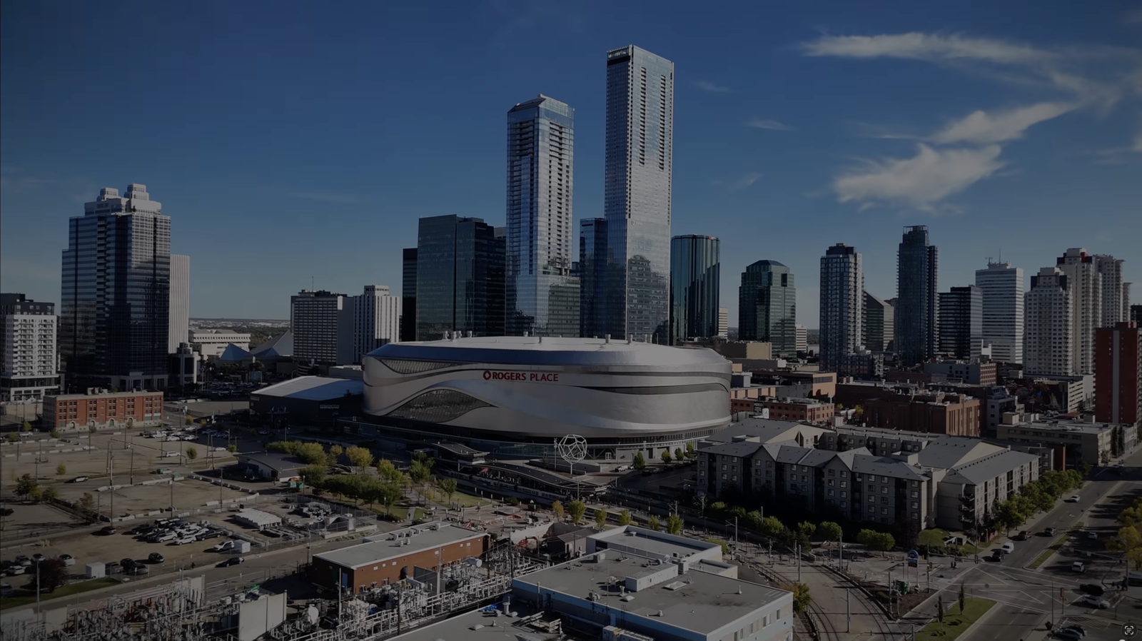 Rogers Place in downtown Edmonton with the ICE District towers and city skyline behind it