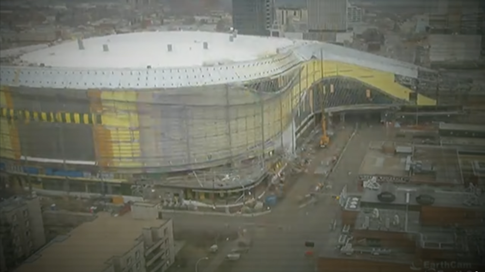 Rogers Place under construction with its roof and exterior taking shape in downtown Edmonton