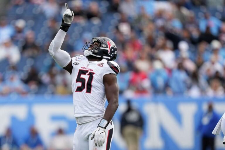 Will Anderson Jr. raises his right index finger while celebrating a sack against Tennessee in a white Houston Texans jersey on October 11, 2026.