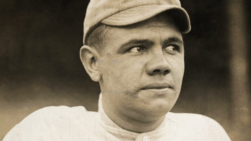 Babe Ruth wearing a Boston Red Sox cap in a 1915 portrait.