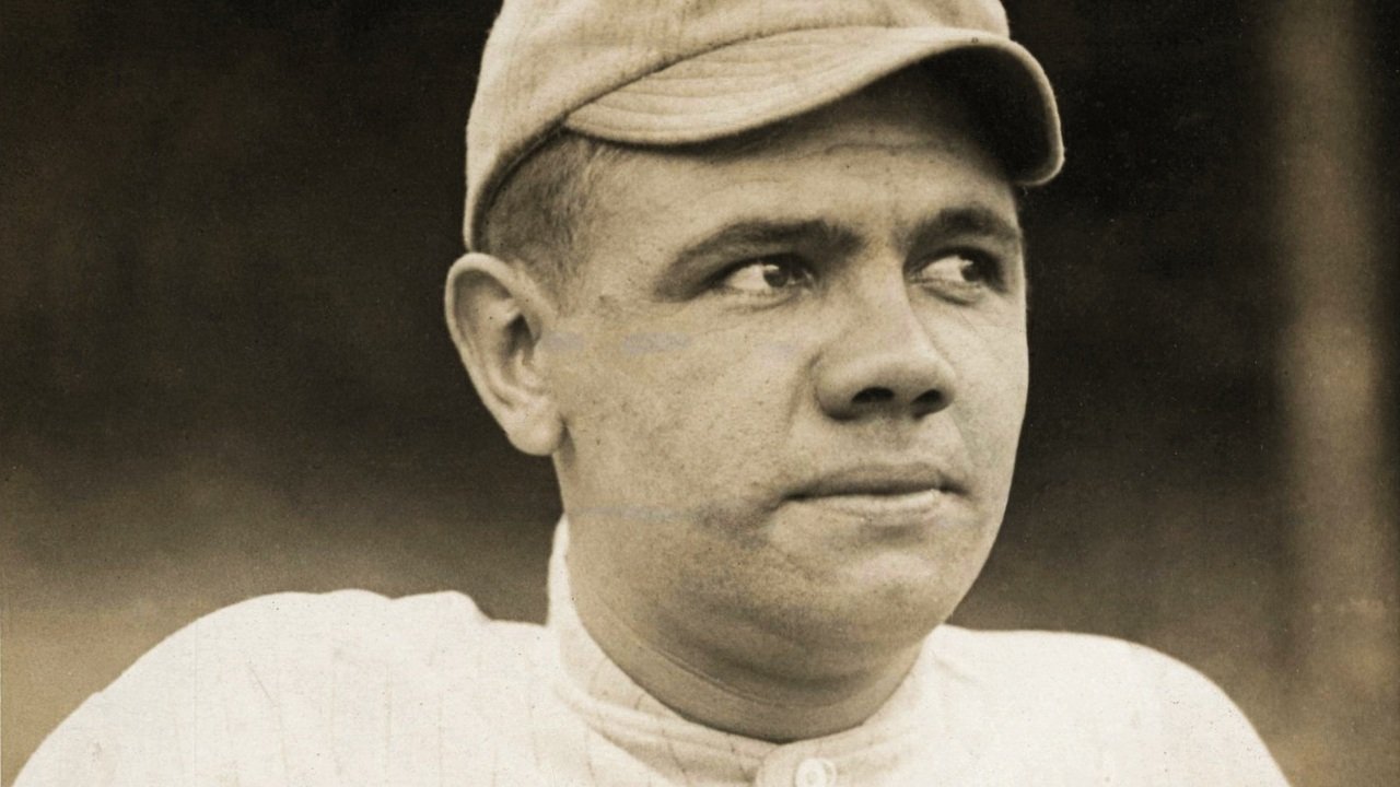 Babe Ruth wearing a Boston Red Sox cap in a 1915 portrait.