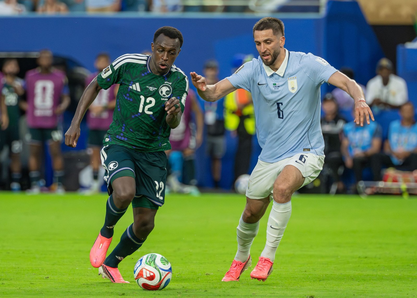 Rodrigo Bentancur of Uruguay, right, alongside Saudi Arabia’s Saud Abdulhamid at the 2026 World Cup.