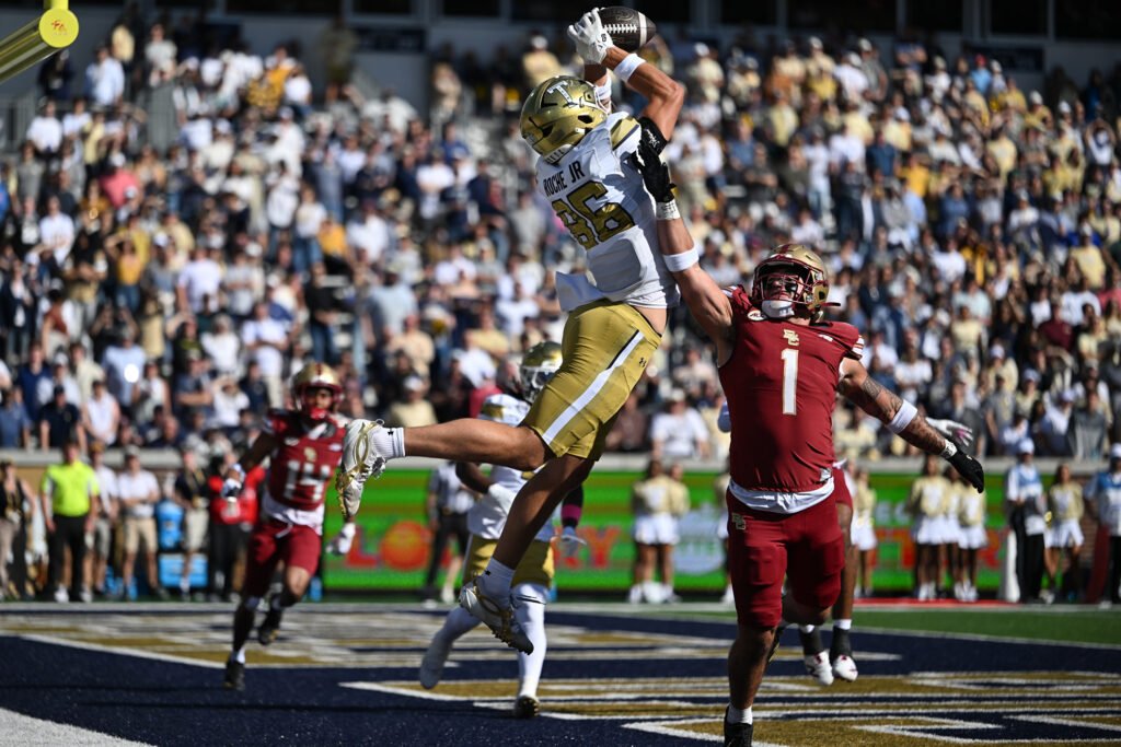 A Boston College defender contests a Georgia Tech receiver’s catch in Atlanta.