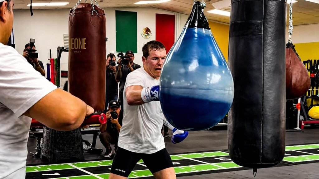 Canelo Alvarez punches a blue water bag during training in Valencia ahead of the Mbilli fight.